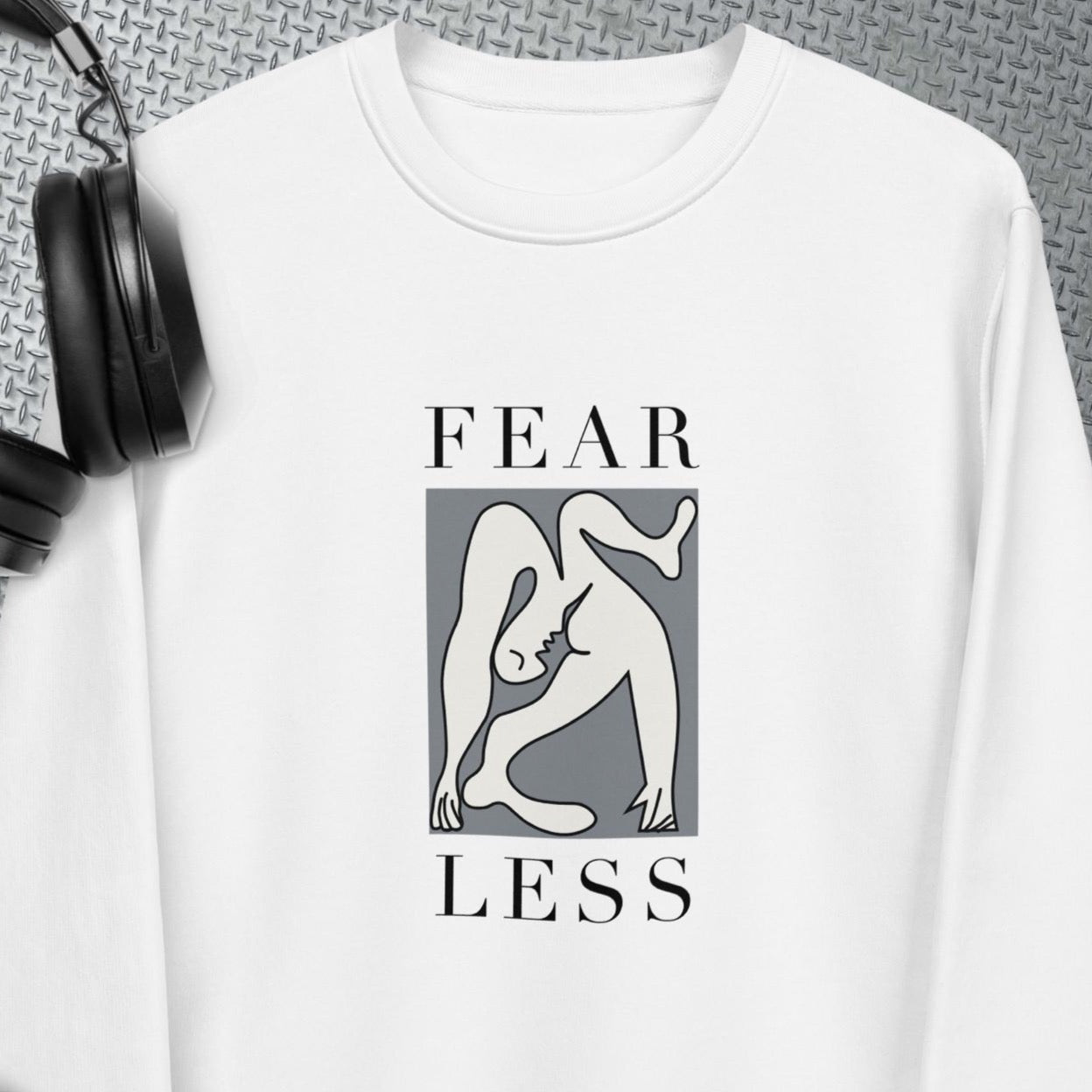 Speak your truth with the feminist 'Fear Less' organic cotton sweatshirt, a perfect sweatshirt for women.