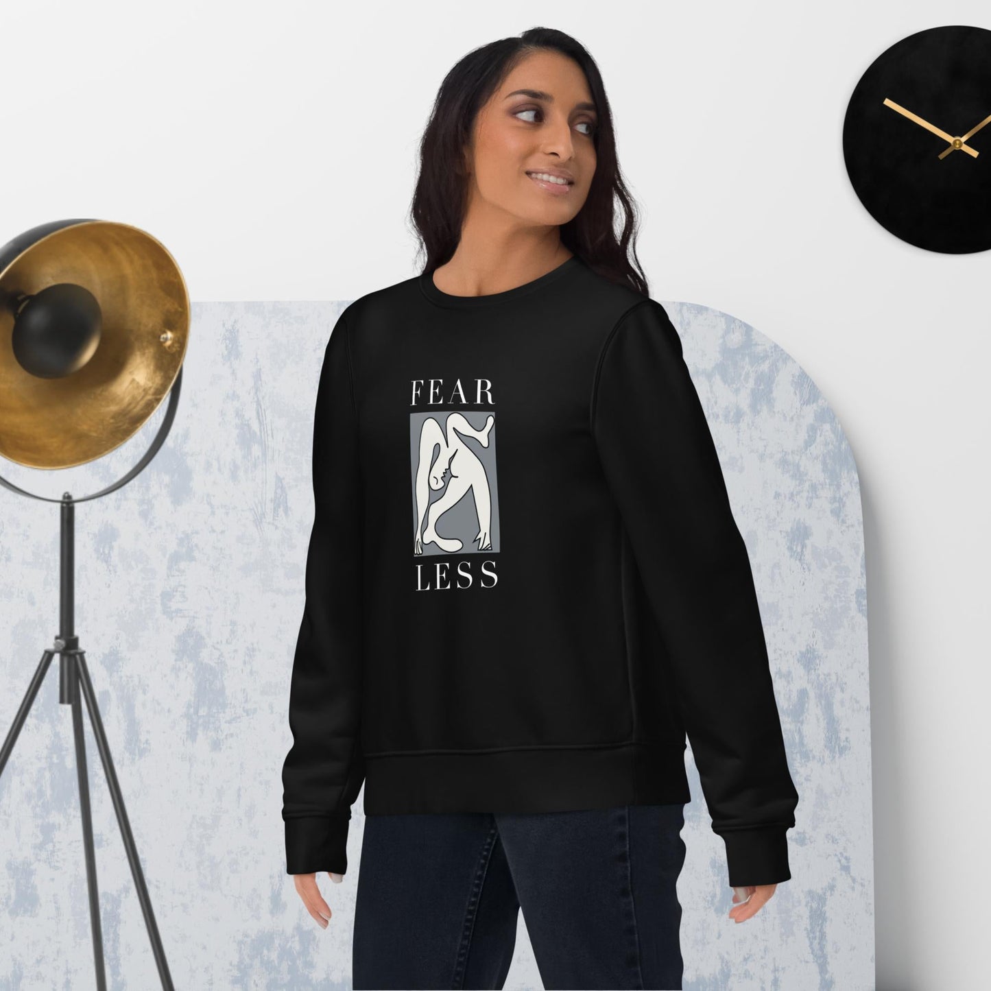 Make a statement in the feminist 'Fear Less' organic cotton sweatshirt, a standout feminist sweatshirt.