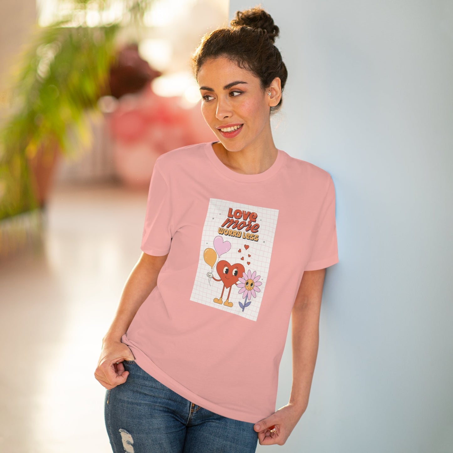 Express yourself with the Positive 'Love More, Worry Less' retro organic cotton t-shirt. Shop now!