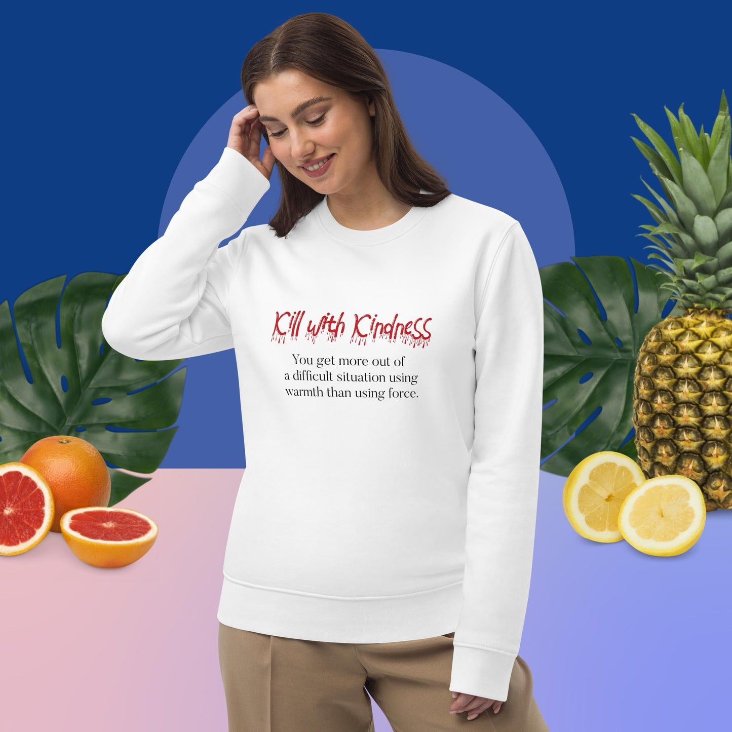 Speak volumes softly: 'Kill With Kindness' quote on a cozy organic top.