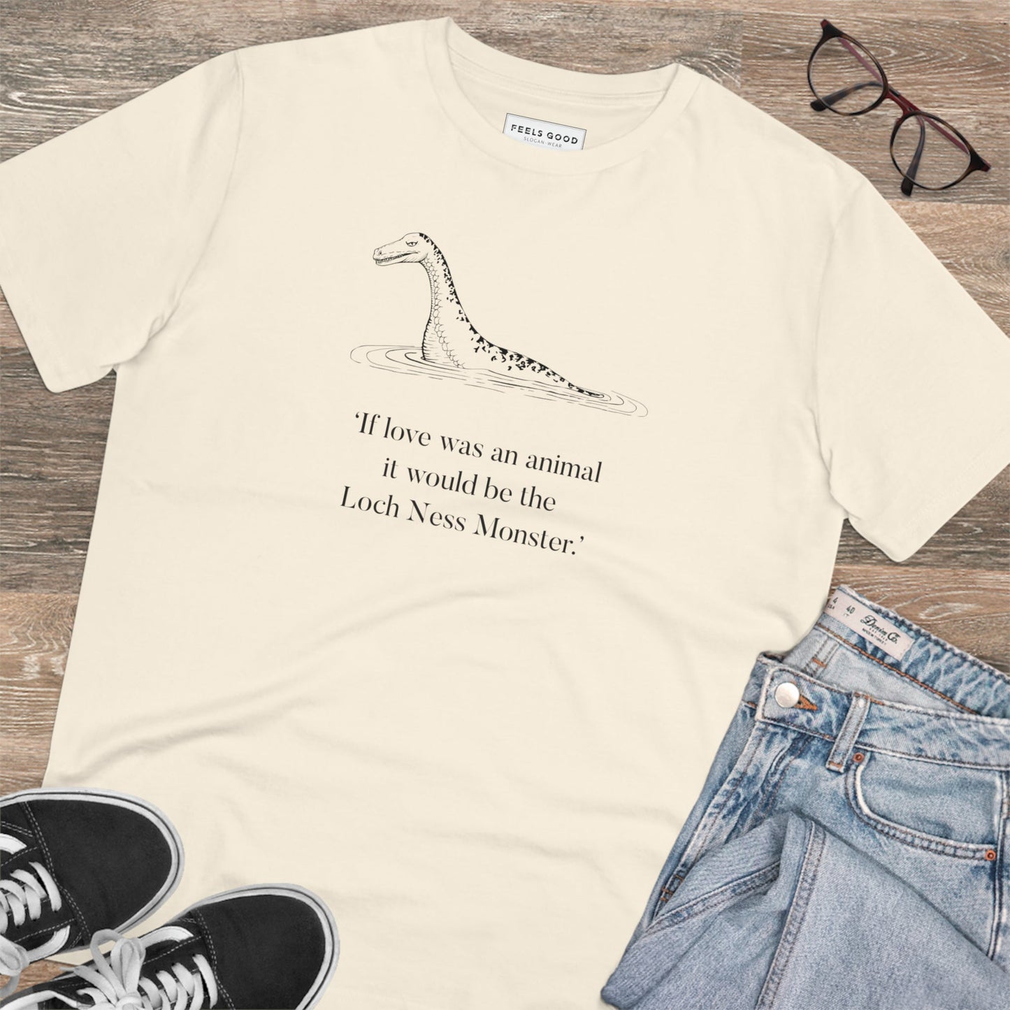 Sport the Scotland 'Nessie' organic cotton t-shirt, ideal for those who love Scottish traditional dress.