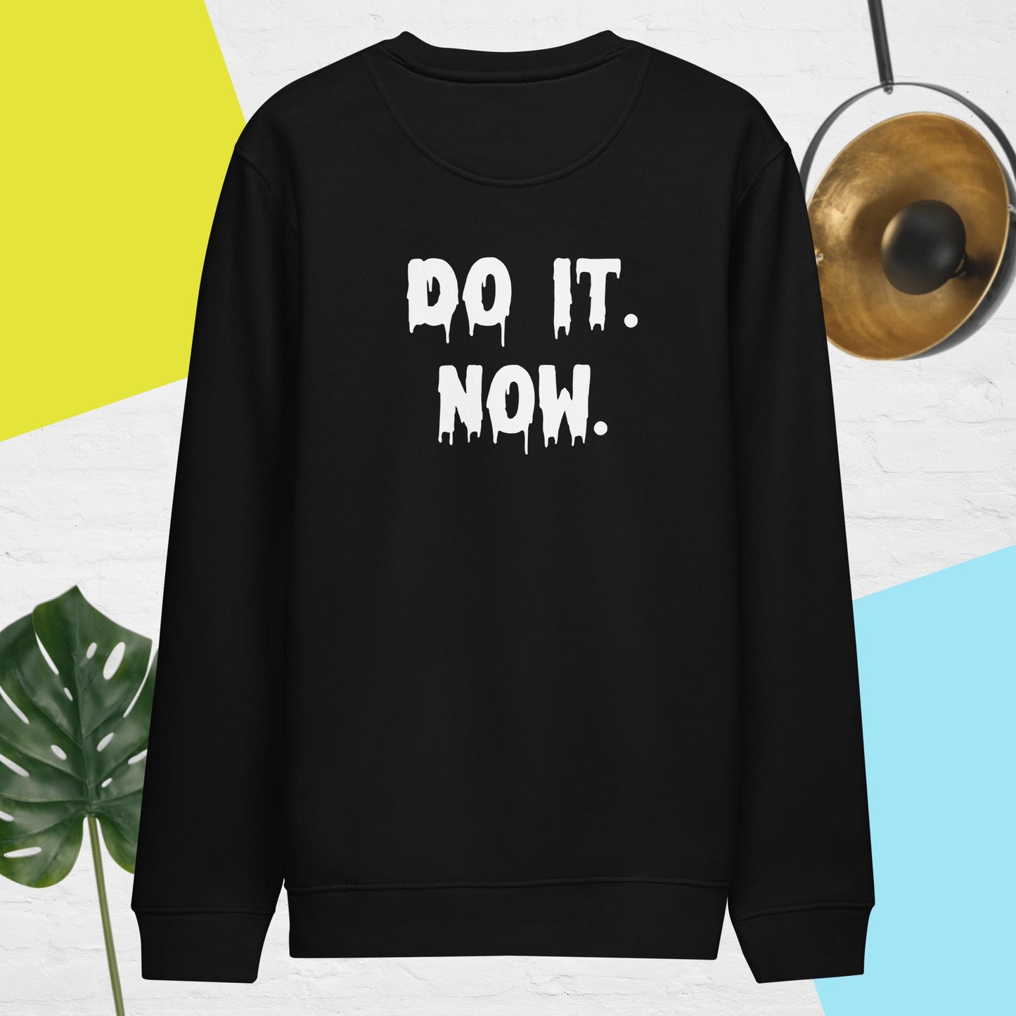 Procrastinate later: 'Do it Now' quote on cozy organic top.