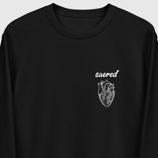 Soft organic cotton featuring a 'Sacred Heart' design.   
