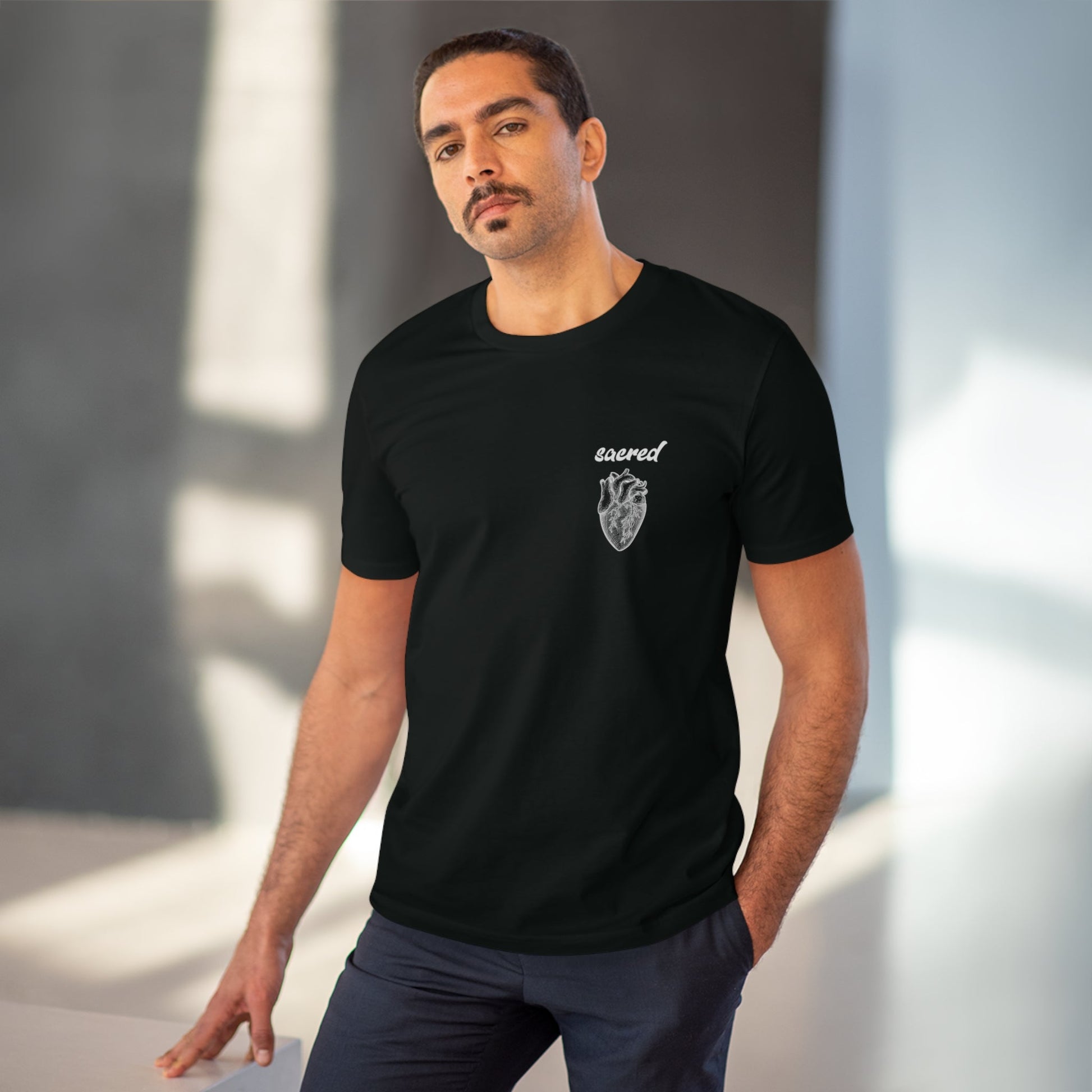 Fun t-shirt featuring modern 'Sacred Heart' design on soft organic cotton.

