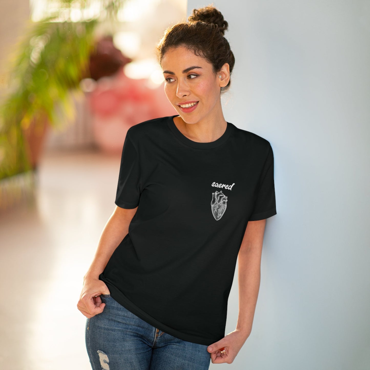 Contemporary 'Sacred Heart' organic cotton t-shirt with bold graphic and fun vibe.

