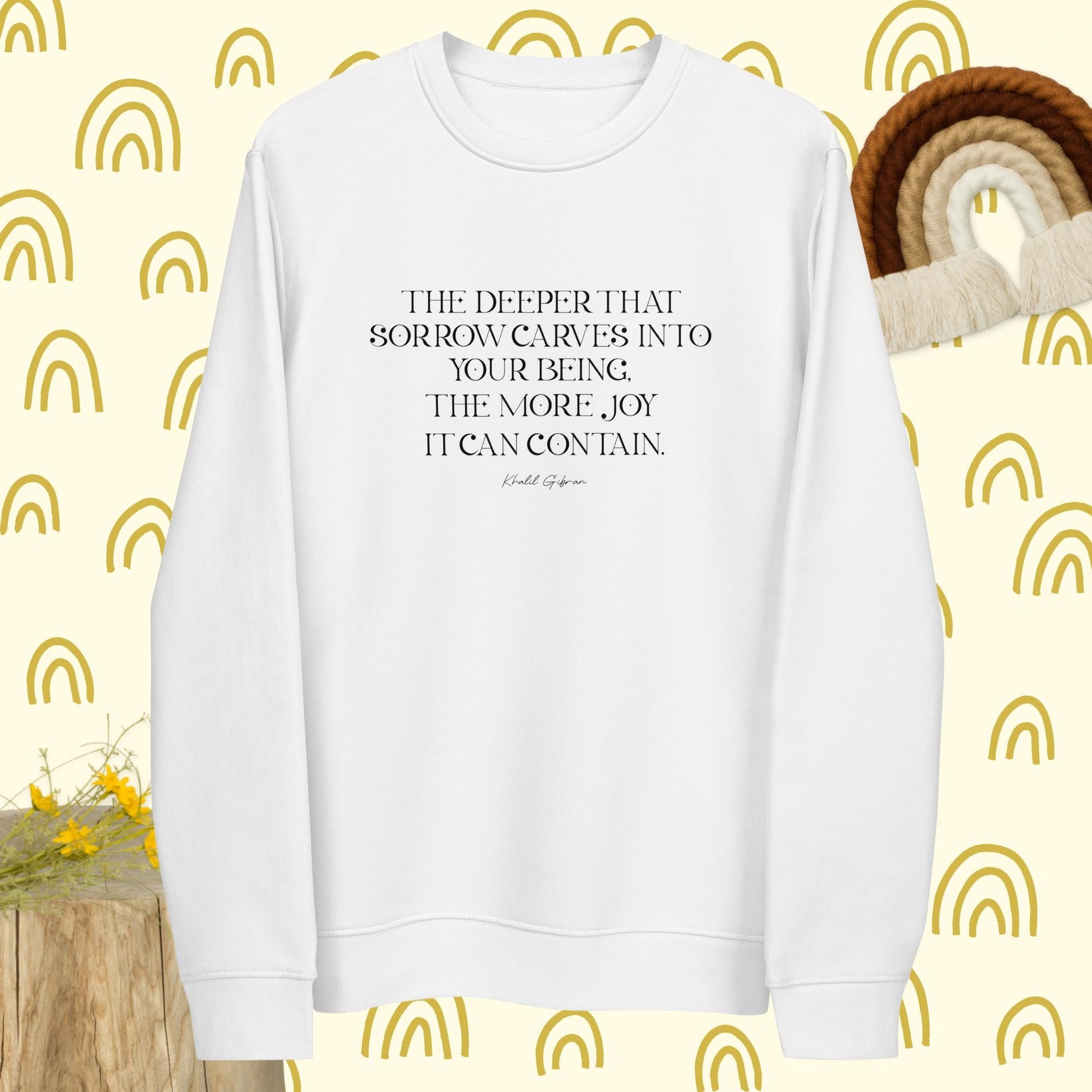 Embrace style with the "Famous Quotes 'Joy & Pain' Khalil Organic Cotton Sweatshirt" today.