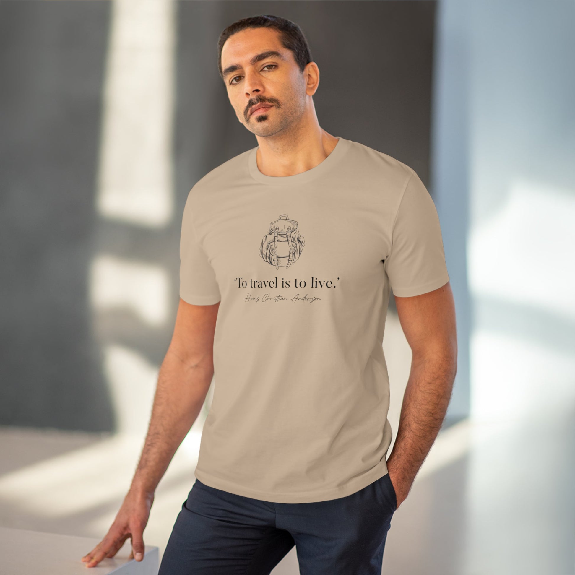 Experience comfort and style with the famous quotes 'Live To Travel' Hans Christian organic cotton t-shirt.