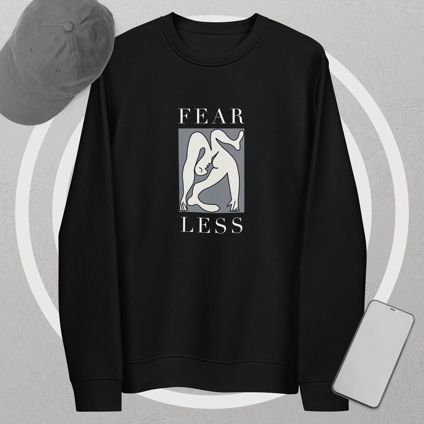 Elevate your wardrobe with the feminist 'Fear Less' organic cotton sweatshirt, a bold feminist sweatshirt.
