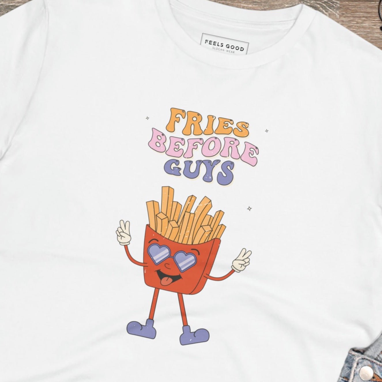 Stand out with the feminist 'Fries Before Guys' organic cotton T-shirt—empowering and stylish!