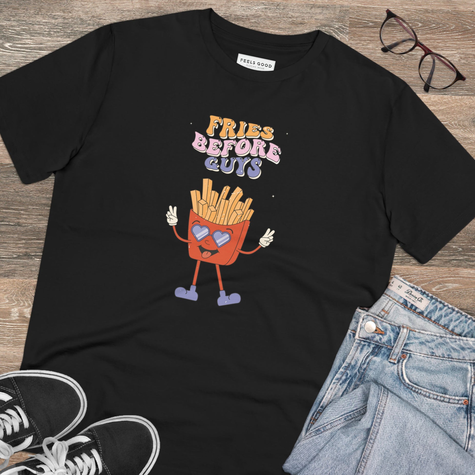 Show your beliefs with the feminist 'Fries Before Guys' organic cotton T-shirt—unisex and bold.