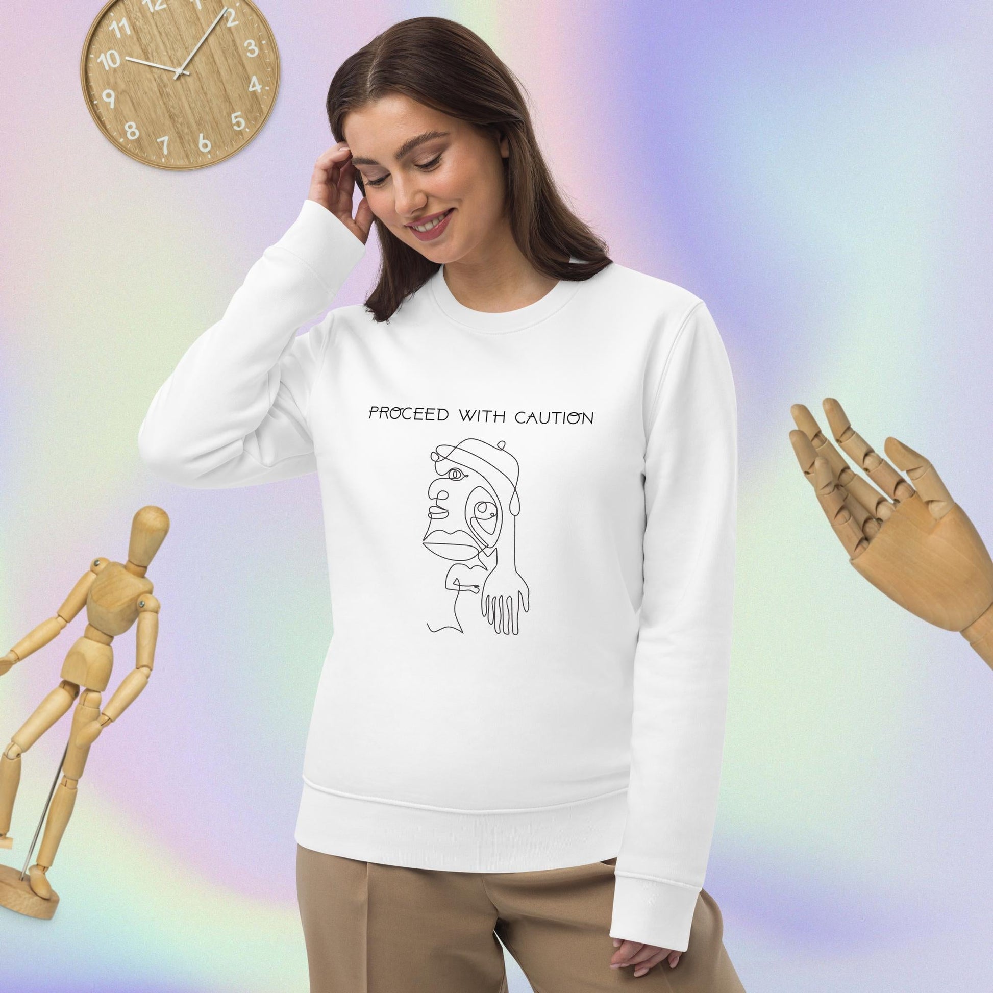 Speak your truth in the feminist 'Proceed With Caution' organic cotton sweatshirt—soft and ethical.