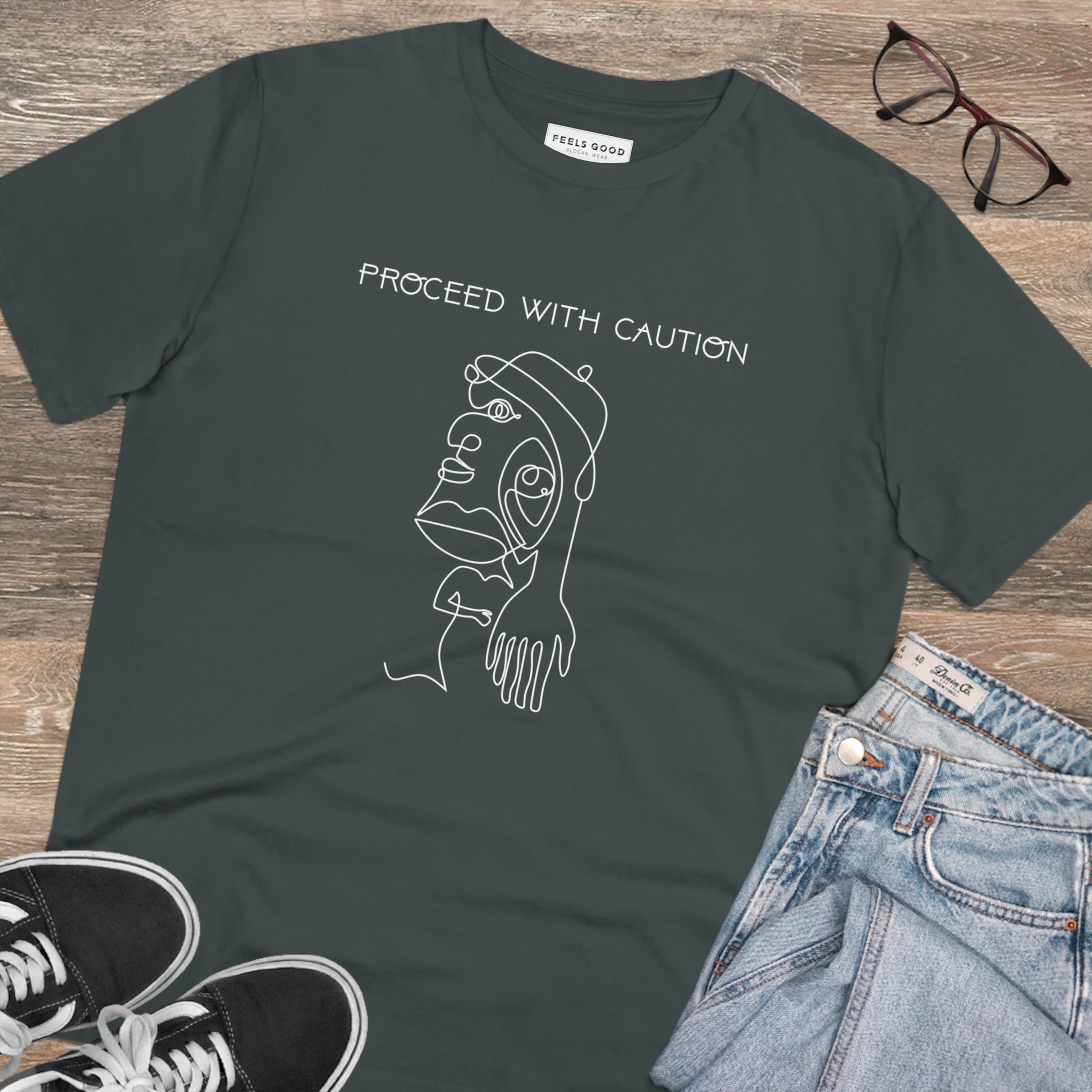 The feminist 'Proceed With Caution' organic cotton t-shirt makes a bold statement for equality.