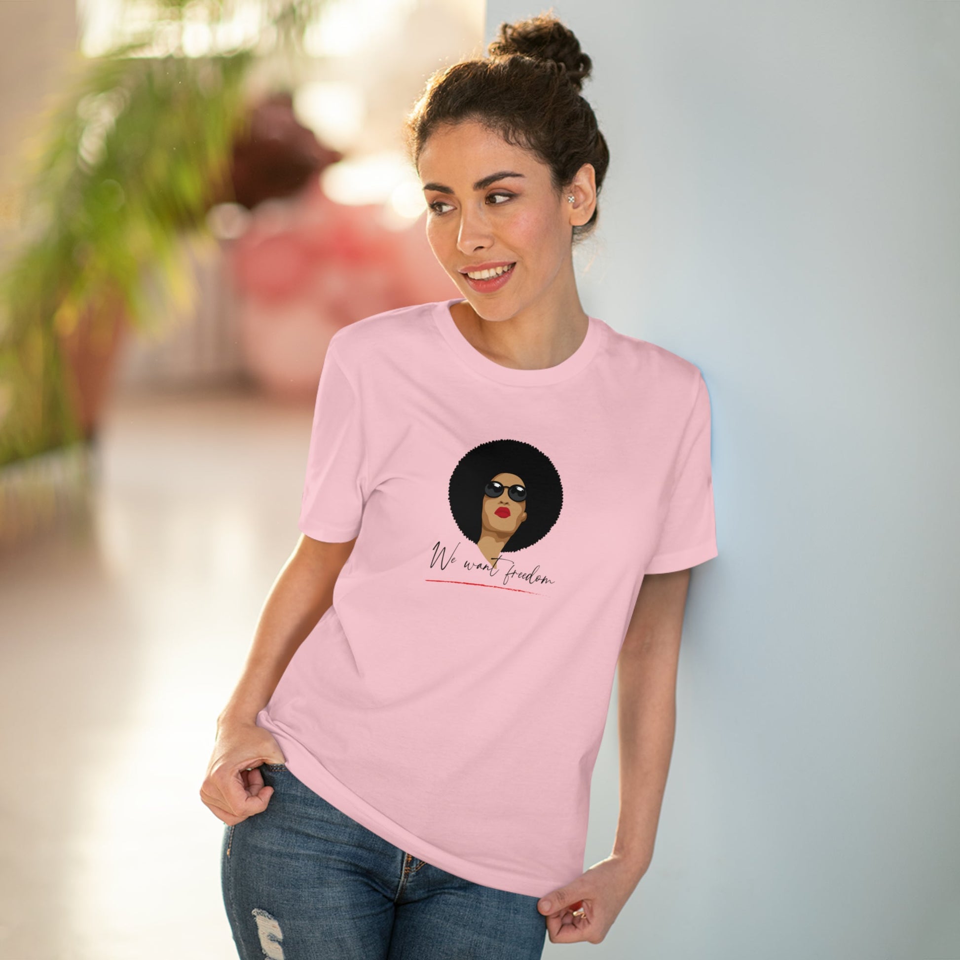 Get the Feminist 'We Want Freedom' organic cotton t-shirt, the ultimate non-binary t-shirt today.