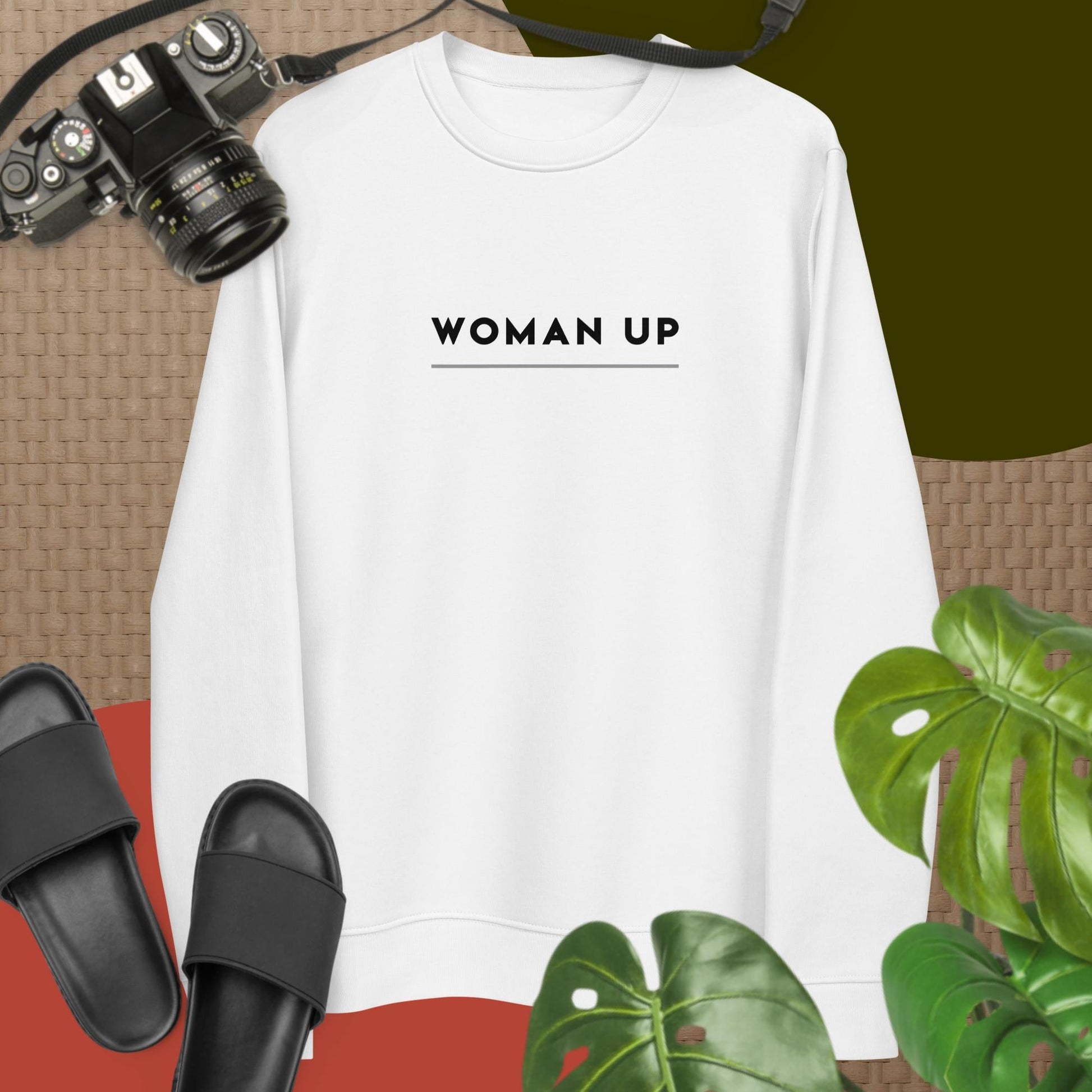 This feminist 'Woman Up' organic cotton sweatshirt is the perfect blend of style and statement.