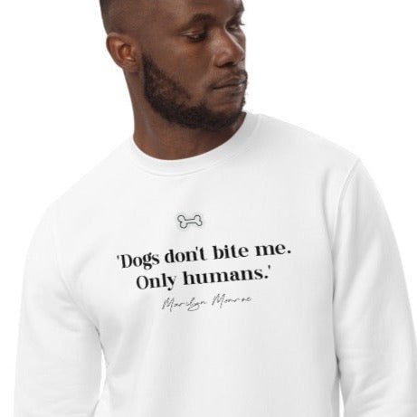 Get cozy with the Organic Cotton 'Dogs Don't Bite' Marilyn Dog Sweatshirt – perfect for pet owners.
