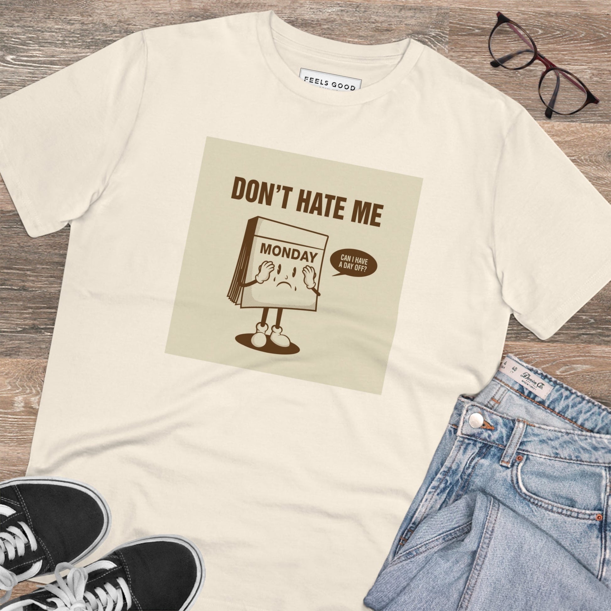 Add humor to your wardrobe with the Positive 'I Don't Hate Mondays' retro organic cotton t-shirt.