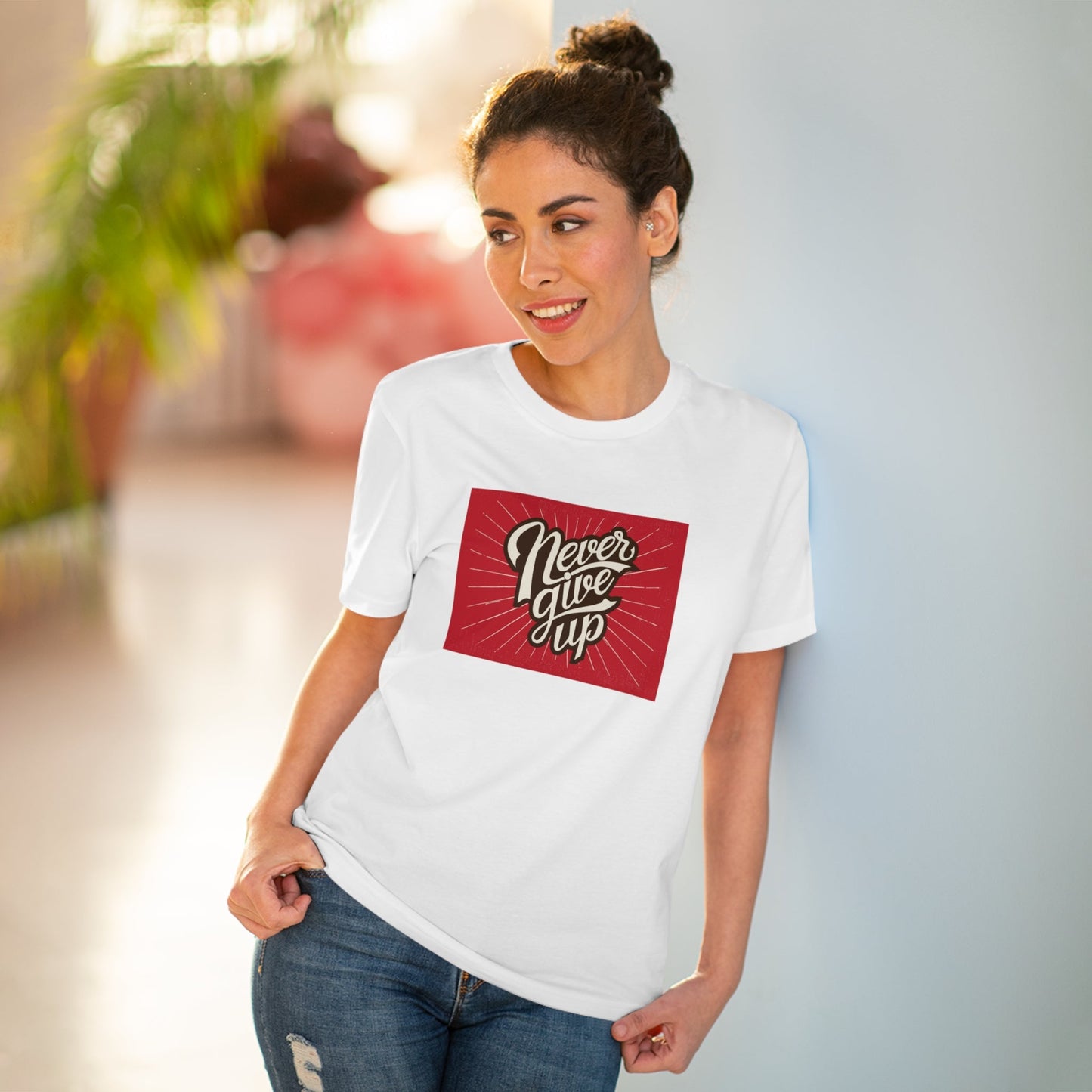 Feel comfy and stylish in the positive 'Never Give Up' retro organic cotton t-shirt. Retro slogan tees!