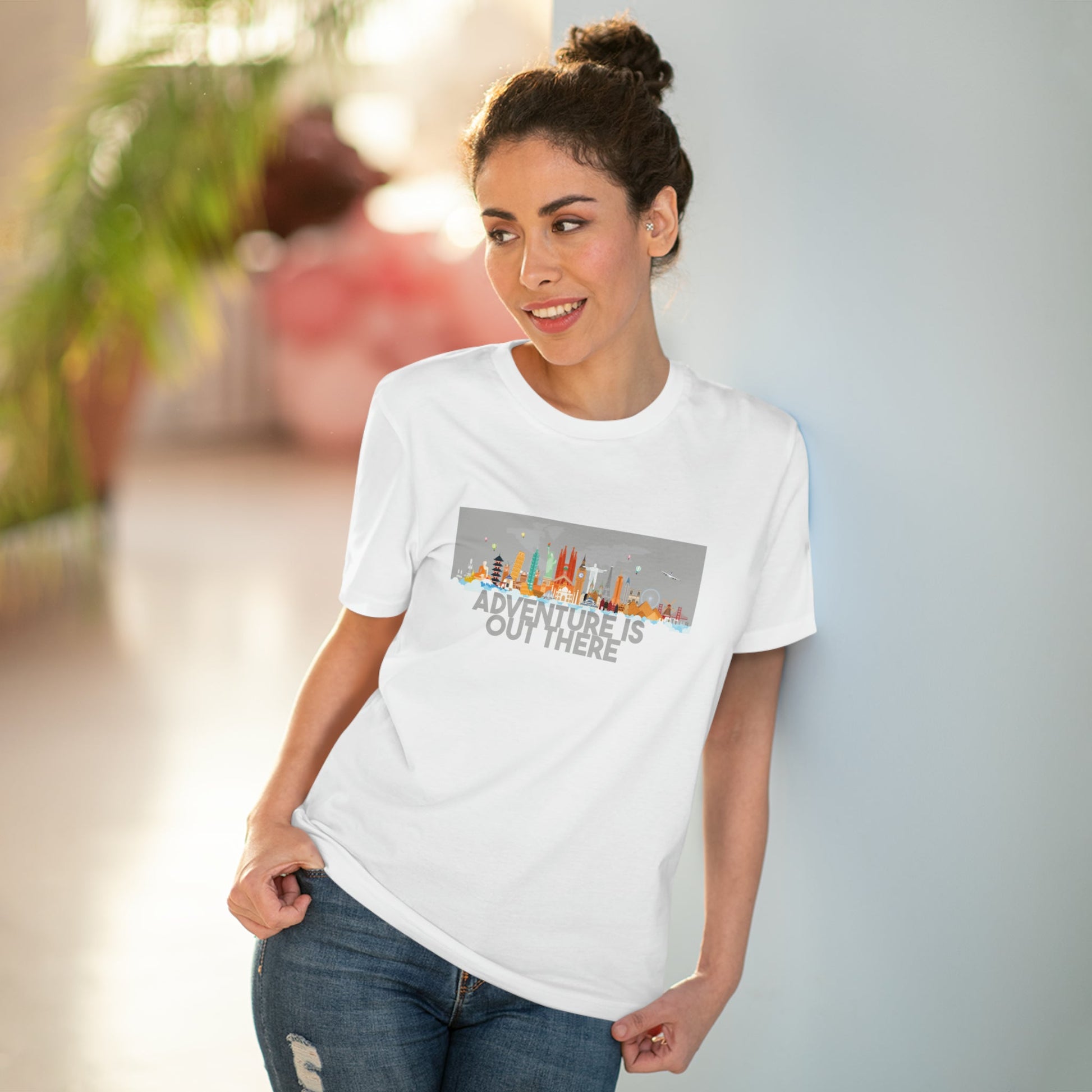 Elevate your travel clothing for women with the Travel 'Adventure Is Out There' organic cotton t-shirt.
