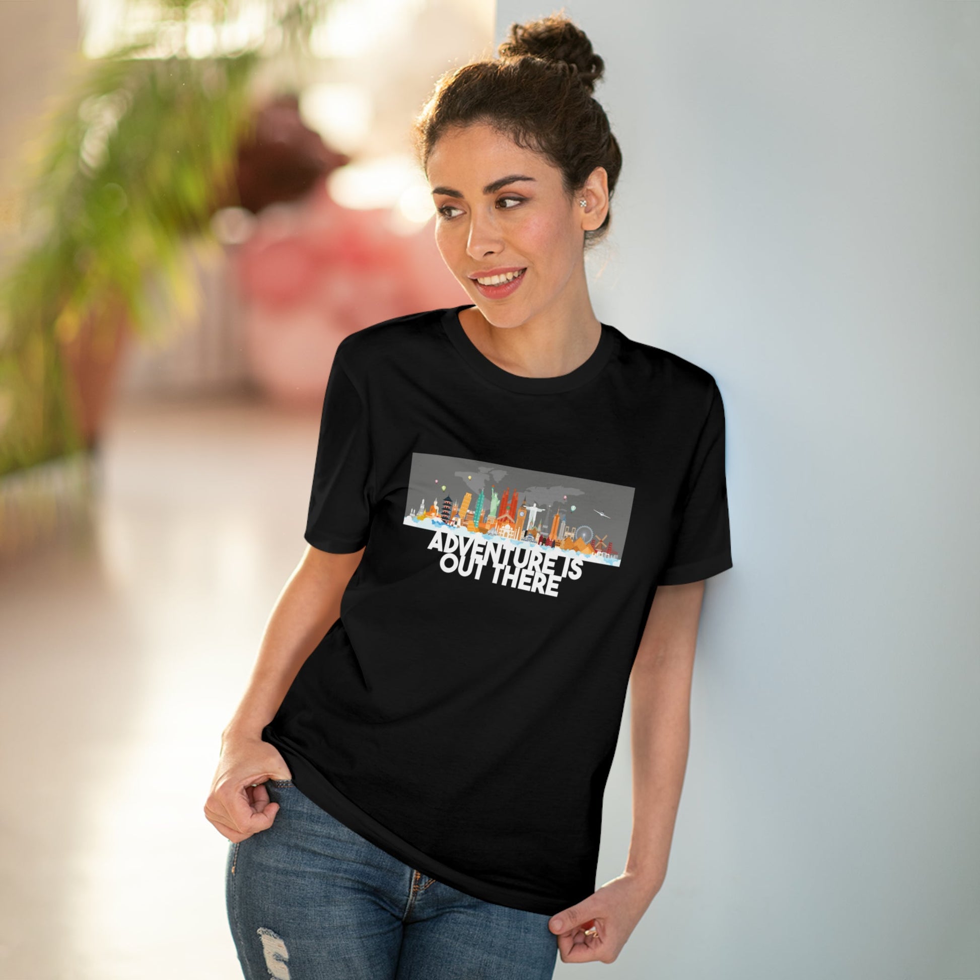 Adventure awaits! Get the Travel 'Adventure Is Out There' organic cotton t-shirt—perfect for explorers.
