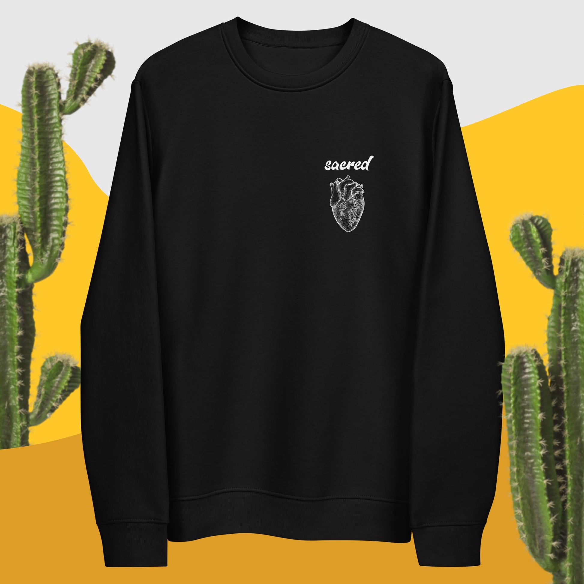 Symbolic warmth: 'Sacred Heart' graphic on cozy organic top.
