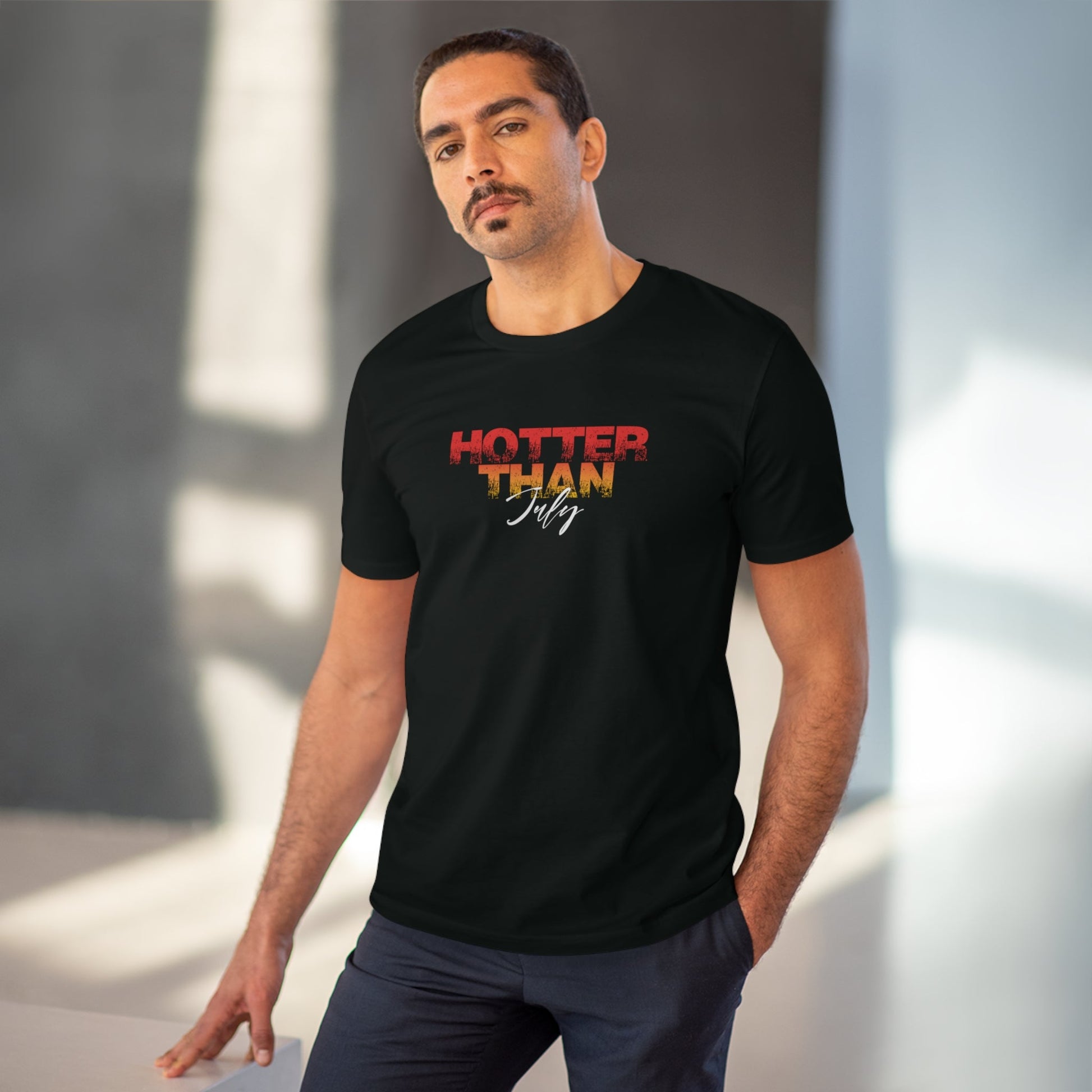 Eco-friendly t-shirt featuring Urban 'Hotter Than July' print in cotton.

